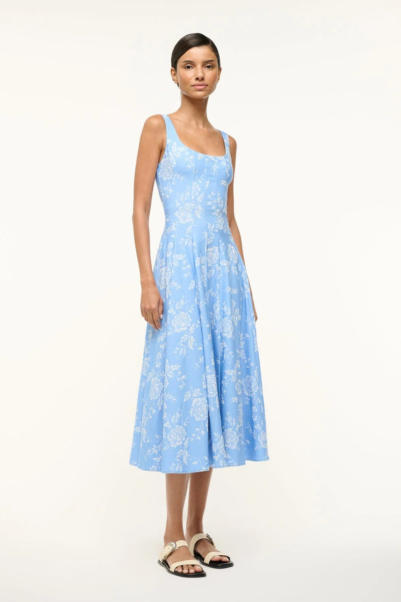 The Wells Dress features a corset-style panel construction to create a flattering, fitted shape through the waist and a full skirt which hits just below the knee. Constructed in lightweight cotton poplin.

75% Rayon 22% Nylon 3% Spandex

Model is 5'11 and wearing a size 4

Hand wash cold or dry clean