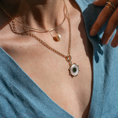 Soleil Mother Of Pearl and Onyx Charm